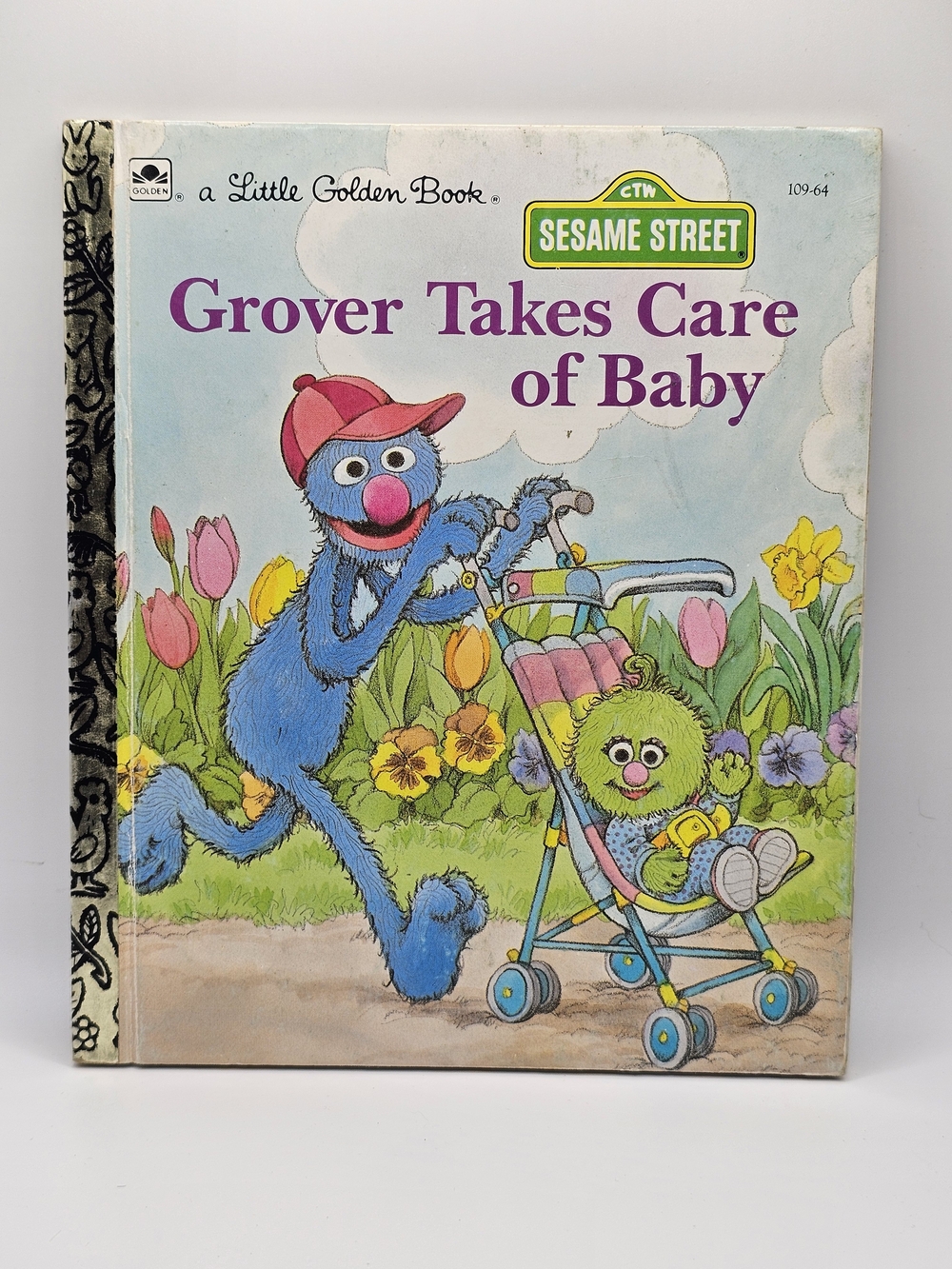 LITTLE GOLDEN BOOK:  Sesame Street: Grover Takes Care of Baby